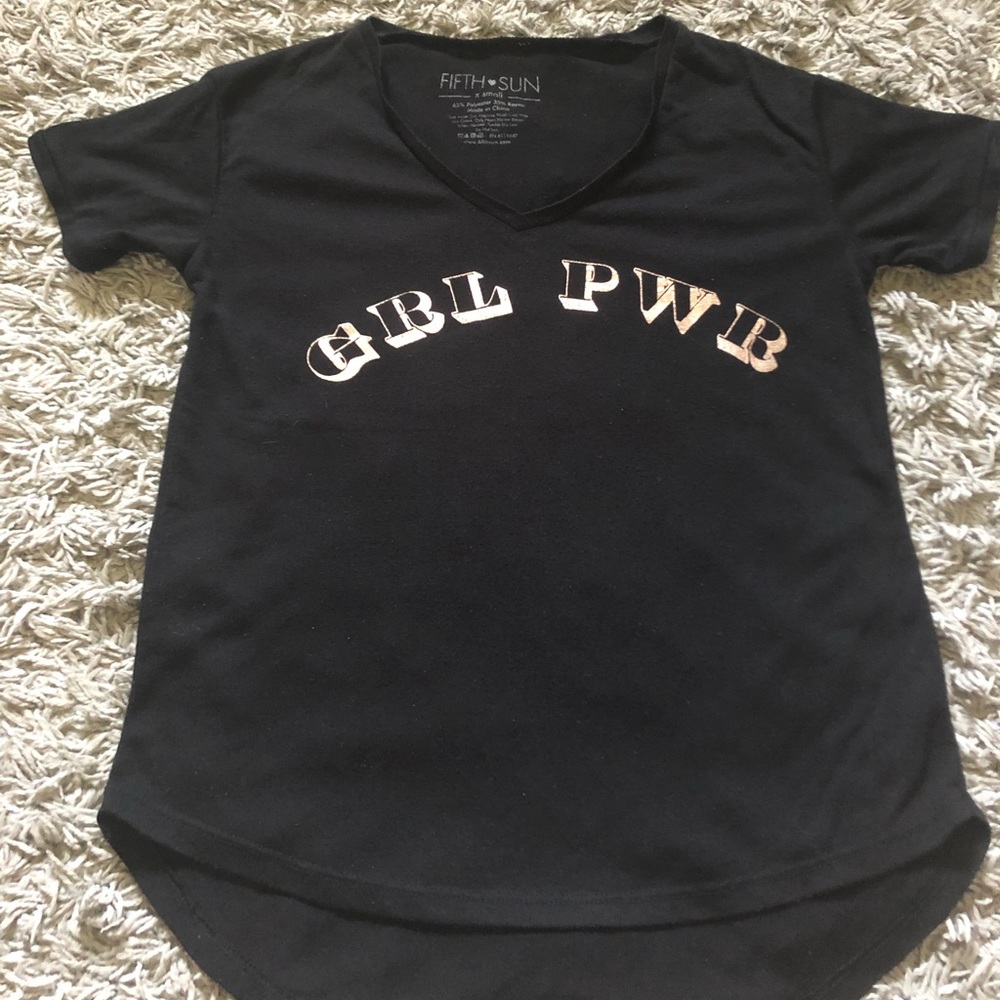 A black “girl power” t-shirt 🌟.